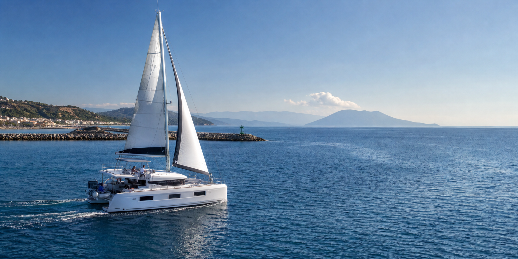 Family swimming beside a yacht near Sicily